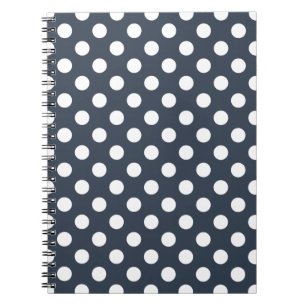 White polka dots on blue-grey notebook