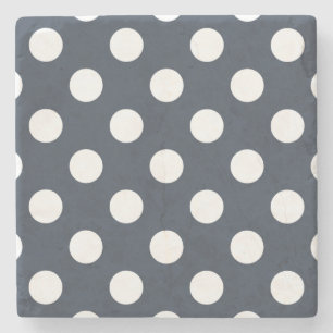 White polka dots on blue-grey stone coaster