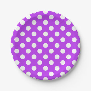 White polka dots on bright purple paper plate