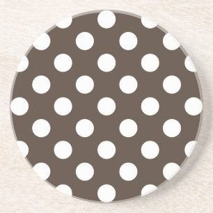 White polka dots on brown coaster