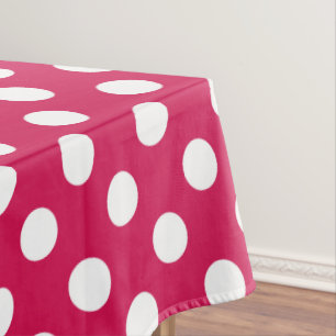 White polka dots on cerise tablecloth
