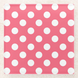White polka dots on coral glass coaster