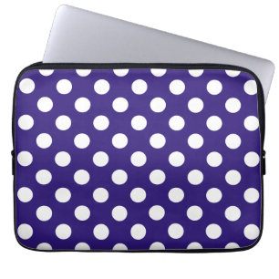 White polka dots on dark blue laptop sleeve