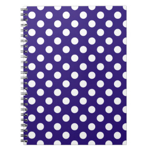 White polka dots on dark blue spiral notebook