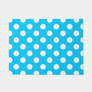 White polka dots on electric blue doormat