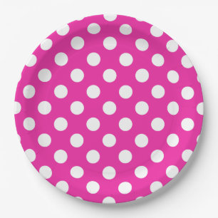 White polka dots on fuchsia paper plate