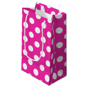 White polka dots on fuchsia small gift bag