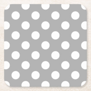 White polka dots on grey square paper coaster