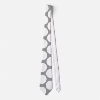 White polka dots on grey tie