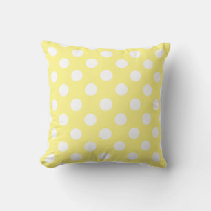 White polka dots on lemon yellow cushion