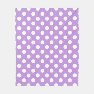 White polka dots on lilac fleece blanket