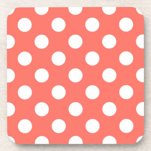 White polka dots on living coral coaster