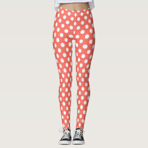 White polka dots on living coral leggings