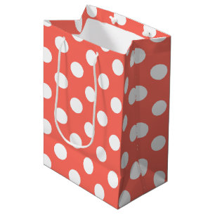 White polka dots on living coral medium gift bag