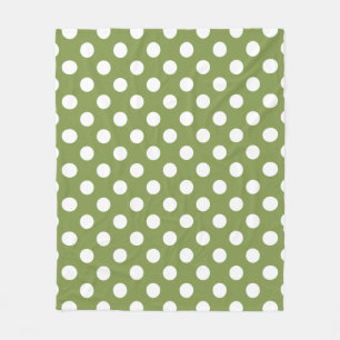 White polka dots on olive green fleece blanket