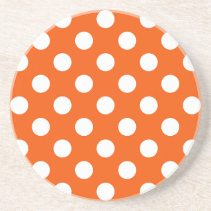 White polka dots on orange coaster