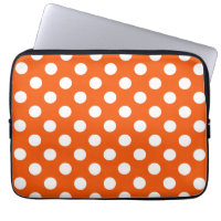 White polka dots on orange