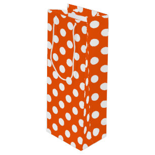 White polka dots on orange wine gift bag