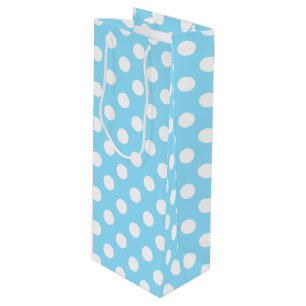 White polka dots on pale blue wine gift bag
