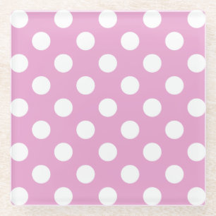 White polka dots on pale pink glass coaster