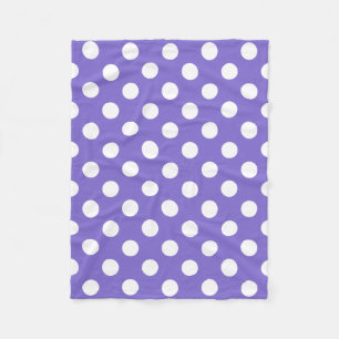 White polka dots on periwinkle fleece blanket