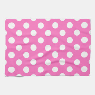 White polka dots on pink tea towel