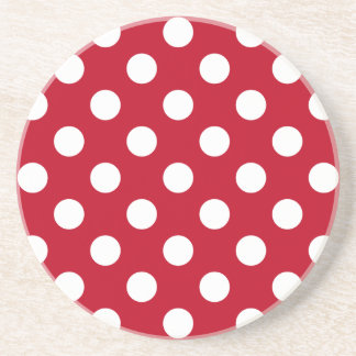 White polka dots on red coaster