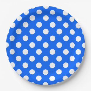 White polka dots on royal blue paper plate