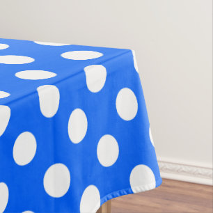 White polka dots on royal blue tablecloth
