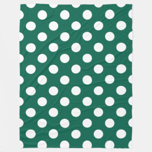 White polka dots on sage green fleece blanket