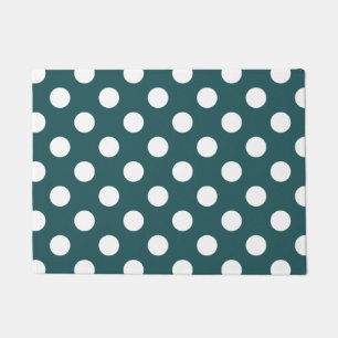 White polka dots on teal doormat