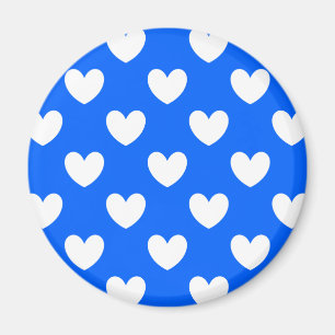 White polka hearts on blue magnet