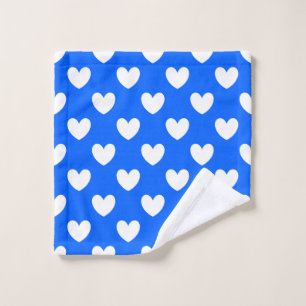 White polka hearts on blue wash cloth