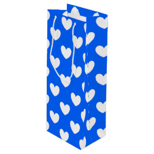 White polka hearts on blue wine gift bag