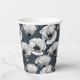 White poppies on navy paper cups