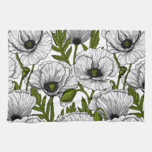 White poppies on white tea towel