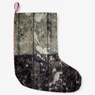 White print on brown wood small christmas stocking