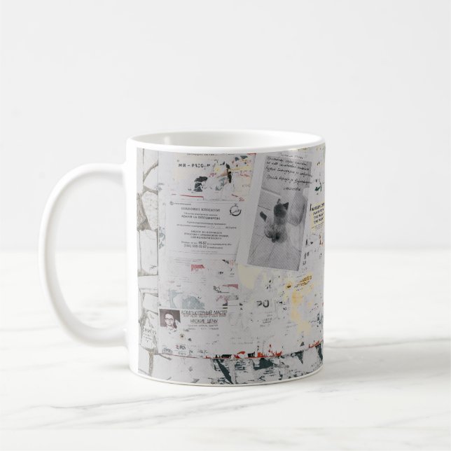 White printer paper on white and grey concrete wal coffee mug (Left)