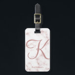 White Rose Marble Rose Gold Monogrammed Initial Luggage Tag<br><div class="desc">This modern and elegant luggage tag features a chic faux rose gold monogrammed initial and name for you to personalise on a white and rose marble background. The back of the bag tag is white and rose marble with your name address and phone number in rose gold. Designed by artist...</div>