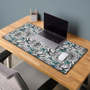 White roses with blue leaves desk mat