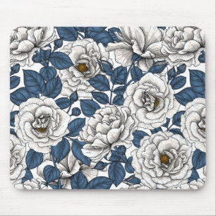 White roses with blue leaves on white mouse pad