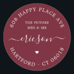 White Script The Future Wedding Return Address Classic Round Sticker<br><div class="desc">Simple, elegant, round wedding or engagement return address label template with white typography on deep burgundy background. The background colour is freely selectable at the design level. These stylish, easy-to-customise address labels feature the text "The Future Mrs. and Mr., " the couple's address, the name in a modern calligraphy font...</div>