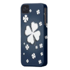 White shamrocks on blue background