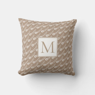 White small flowers and monogram rustic cushion