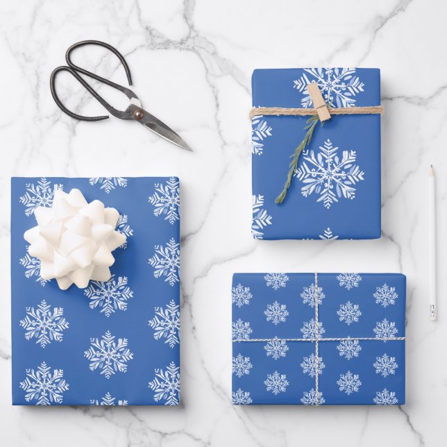White Snowflake on Blue Christmas Holiday Pattern Wrapping Paper Sheet (Front)