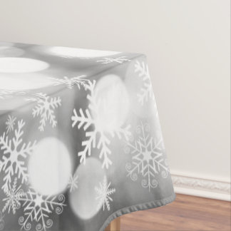 White snowflakes on grey Xmas tablecloth. Tablecloth