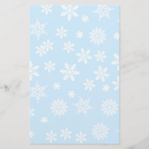 White Snowflakes on Light Blue Background