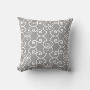 White spiral vector pattern on grey cushion