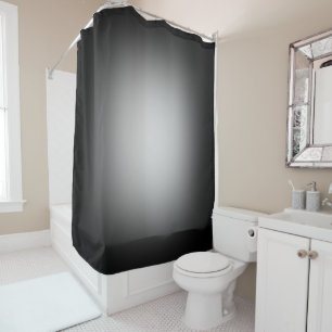 White spotlight on black shower curtain