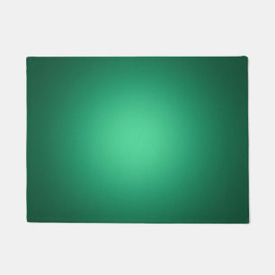 White spotlight on green doormat